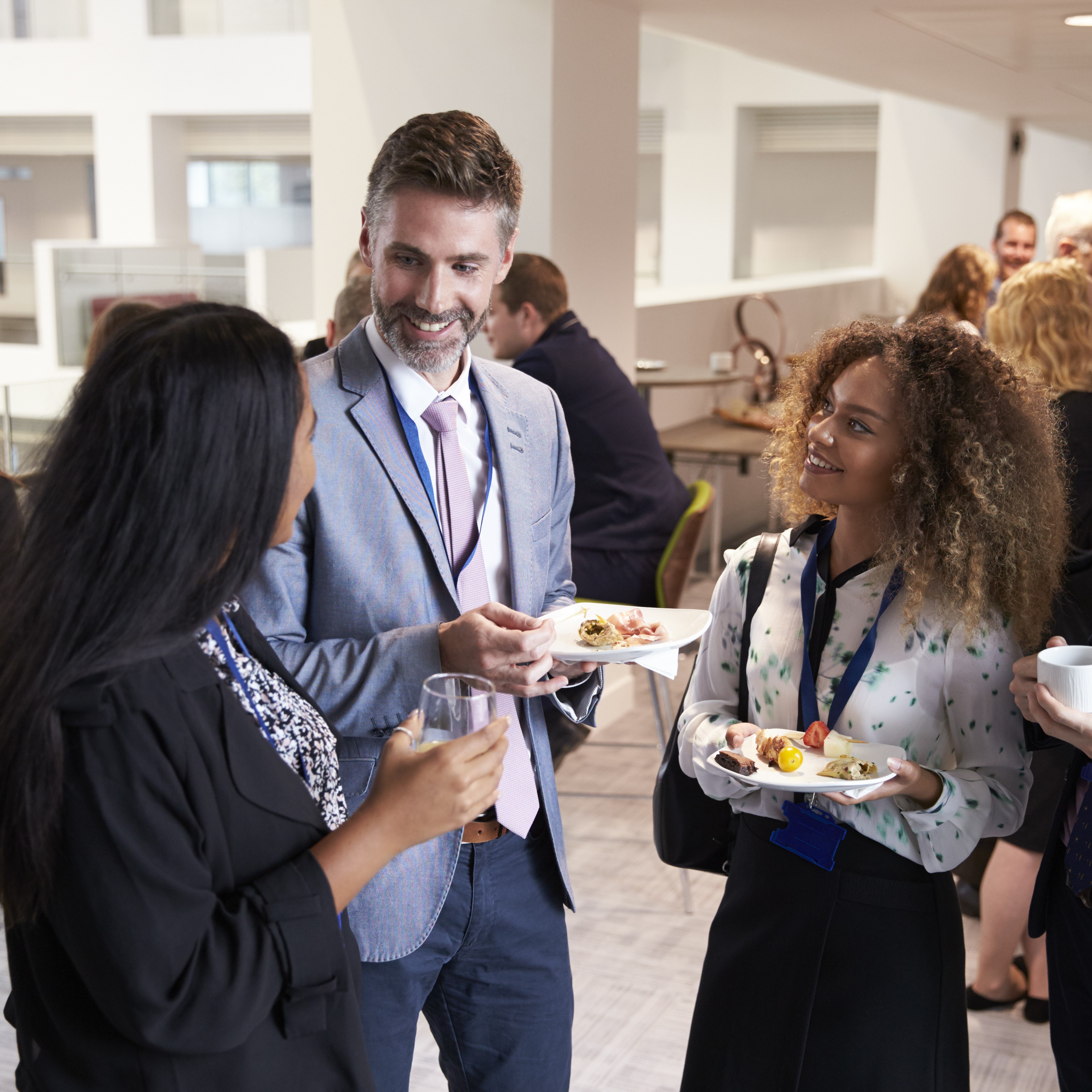 people networking at a meeting